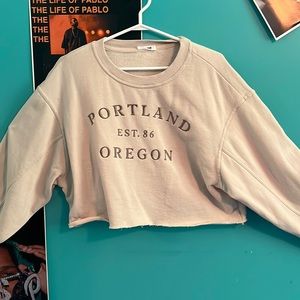 cream coloured x small t track suit from garage